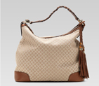 eva hobo with woven leather, tassels, and bamboo detail 282338 KC11G 9572